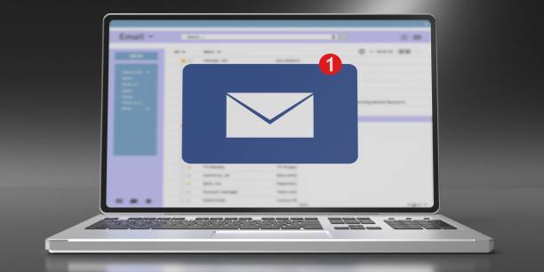 istock Email message inbox notification on laptop screen, grey black background. 3d illustration 1229883389