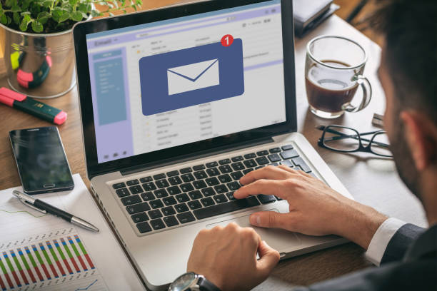 istock Email message inbox notification on laptop screen, business background 1229883656