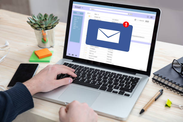 istock Email message inbox notification on laptop screen, business background 1229883756
