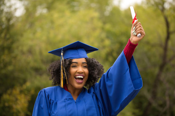 istock Excited young woman on graduation day. 1229883761