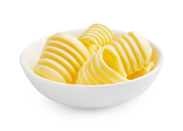 istock Butter curls or butter rolls in white bowl isolated on white background. 1230004214