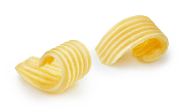 istock Butter curls or butter rolls isolated on white background 1230017965