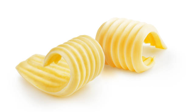 istock Butter curls or butter rolls isolated on white background 1230025625