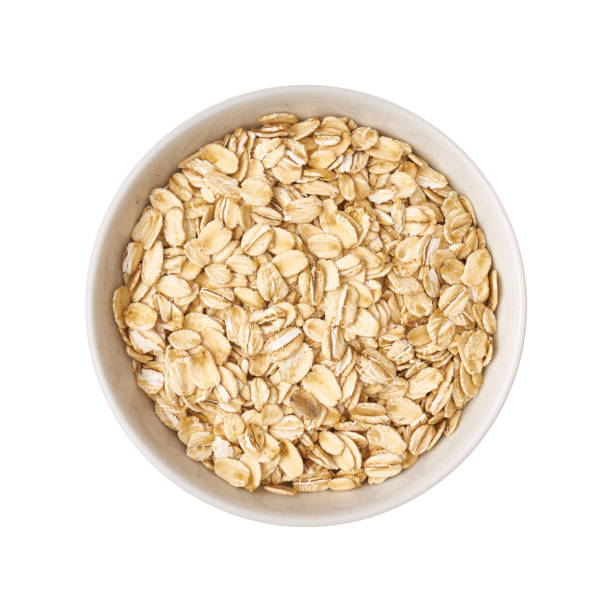 istock Grains, groats, flakes in a bowl top view 1230074453