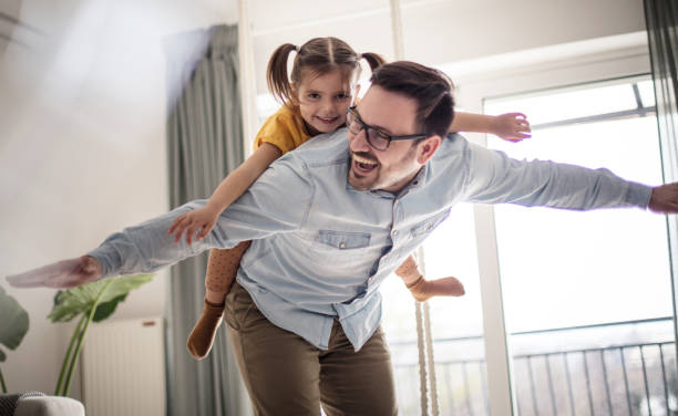 istock Dad is here to give you his wings. 1230121106