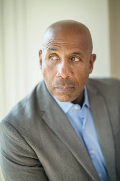 istock Happy mature African American man at work. 1230139884