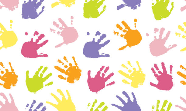 kolorowe nadruki dłoni dzieci, bezszwowy wzór. ilustracja wektorowa - fingerprint backgrounds identity human finger stock illustrations
