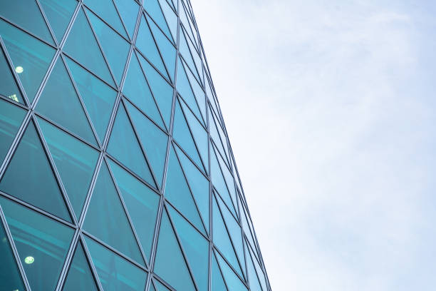 istock Skyscraper windows in shape of triangle close up 1230195443