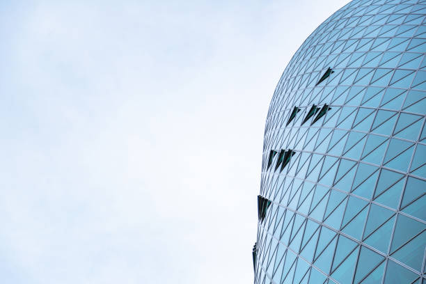 istock Skyscraper windows in shape of triangle close up 1230195447
