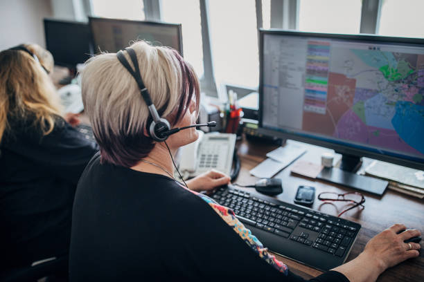 istock Mature women guiding cars on computer maps 1230206625