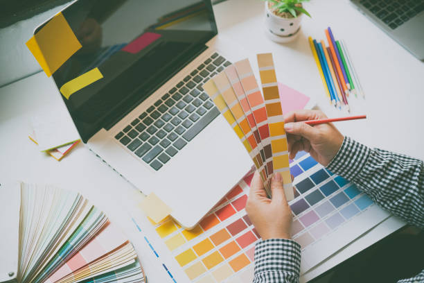 istock The graphic designer creative team is currently working on the design and color selection on the guide color for advertising design. 1230254122