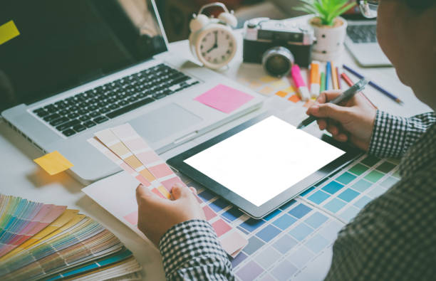 istock The graphic designer creative team is currently working on the design and color selection on the guide color for advertising design. 1230255655