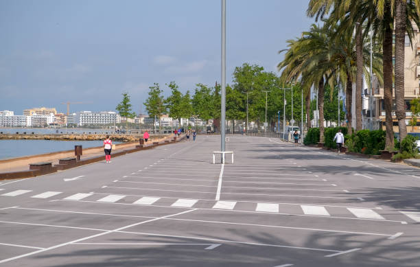 istock Parking divided by a pedestrian crossing on the beach background 1230259334