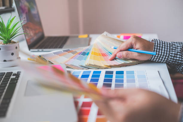 istock The graphic designer creative team is currently working on the design and color selection on the guide color for advertising design. 1230260281