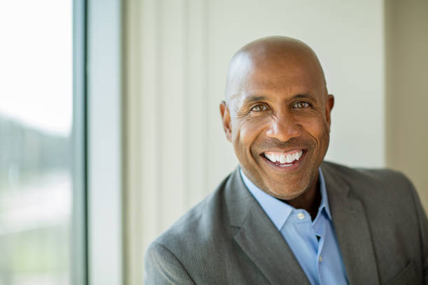 istock Happy mature African American man at work. 1230295077