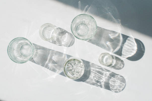istock Abstract glassware shadows background. Reflections at natural light. 1230301296