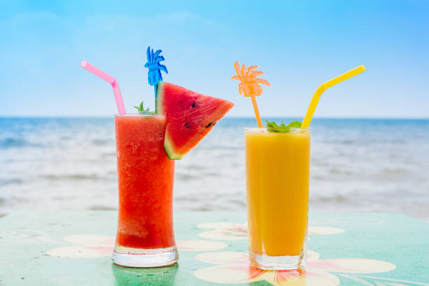 istock Mango shake and watermelon shake on the tropical beach 1230351155