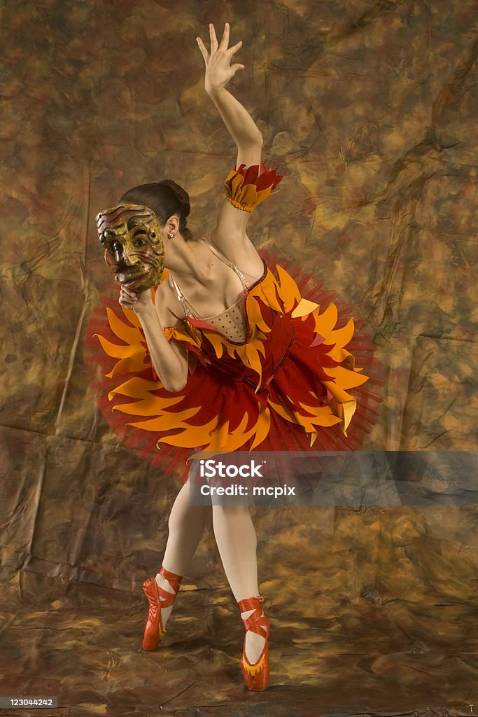 Janus Ballerina in Costume Firebird - Foto stock royalty-free di Danza classica