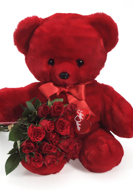 istock RED TEDDY BEAR AND ROSES FOR SAINT VALENTINE'S DAY 1230455023