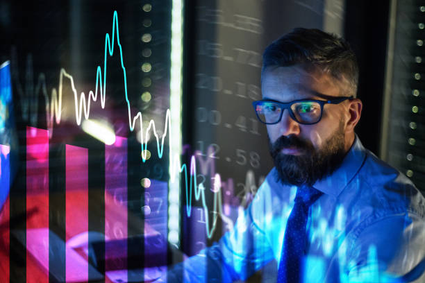 istock Businessman with computer working late. Financial crisis and coronavirus concept. 1230461290