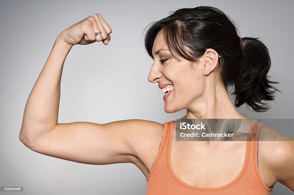 Strength/Fitness für Frauen - Lizenzfrei Muskeln zeigen Stock-Foto