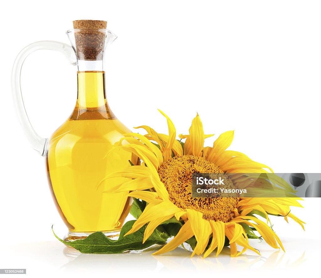 Óleo de semente de girassol com flor - Foto de stock de Amarelo royalty-free