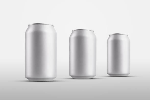 istock Mockup of standing little tin cans with a refreshing drink, for design presentation. 1230548541