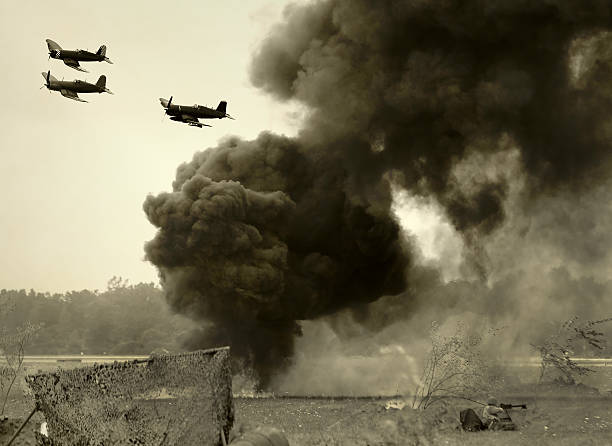 Wolrd War II era battle World War II era battlefront and aerial attack (present day photos aged using software) battlefield photos stock pictures, royalty-free photos & images