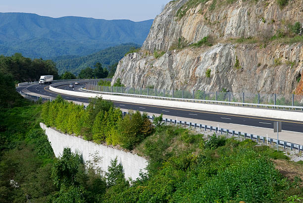 A tractor trailer truck rounds a bend on I-26 near Sam's Gap in the Appalachian Mountains of northeast Tennessee.