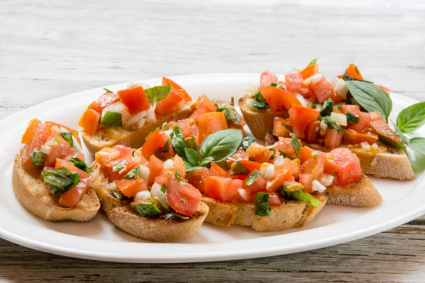 istock Bruscheta, antipasti Typical Italian with tomato, basil and toast 1230583366