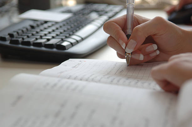 donna d'affari di pianificazione " - desk writing business human hand foto e immagini stock