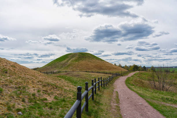 istock The Royal Mounds (Kungshogarna) three large barrows located in Gamla Uppsala. Archeological site 1230679614