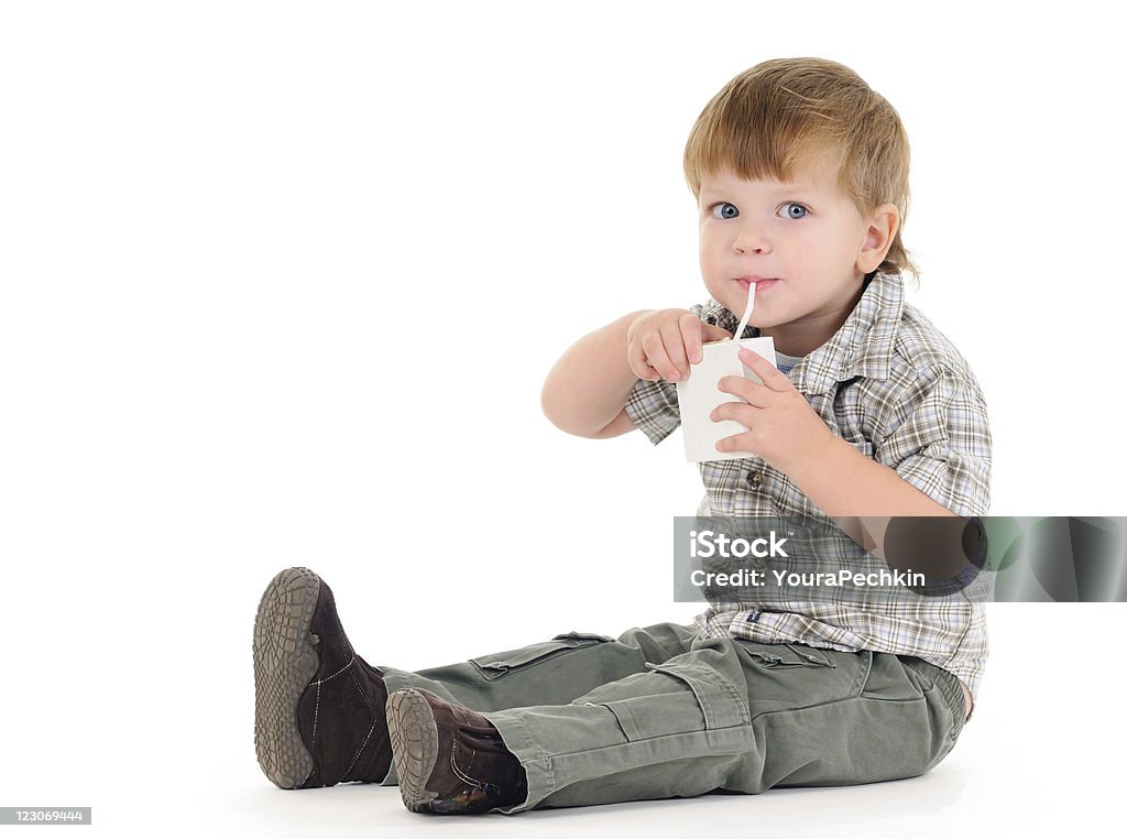 Garçon boire de jus de fruits - Photo de Enfant libre de droits