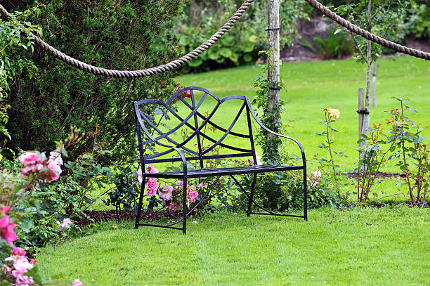 istock Single metal bench in the garden 123075901