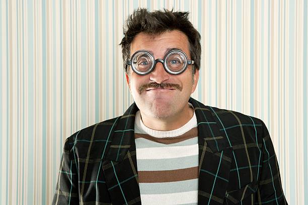 istock nerd silly crazy myopic glasses man funny gesture 123078336