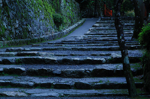 Peaceful, dark scenery in Ohara (Kyoto Prefecture, Japan) before sunrise. Stone stairs leading to a shrine. 
