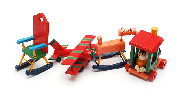 collection of vintage wooden toys isolated on white