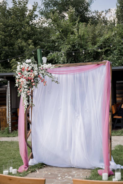 istock arch for the wedding ceremony in the park 1230820543