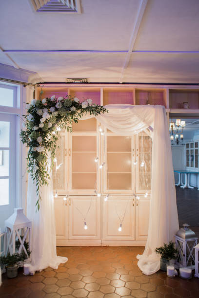 istock arch for the ceremony with light bulbs 1230834997