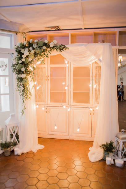 istock arch for the ceremony with light bulbs 1230849986
