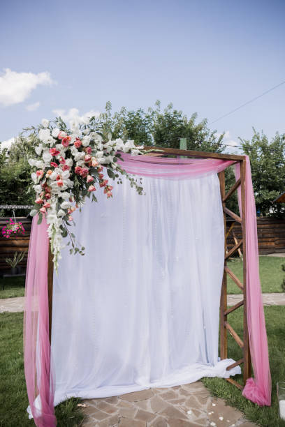 istock arch for the wedding ceremony in the park 1230865894
