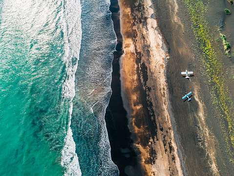 Abstract aerial view of a sand beach. Colourful natural patterns in layers in a beautiful natural light