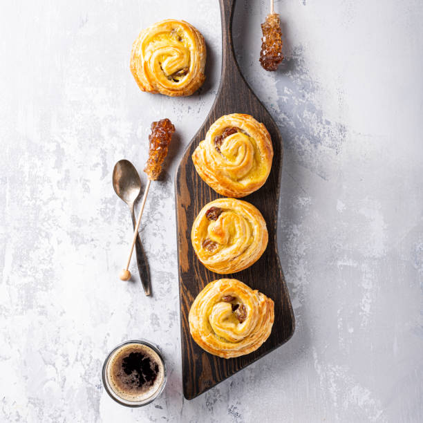 istock Sweet swirl buns with raisins for breakfast 1230894030