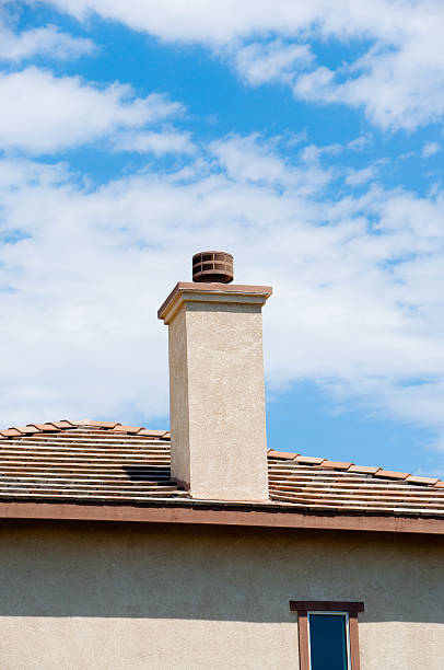 istock chimney on top of a house 123091628
