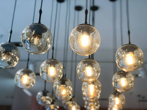 istock Round lamps with lights on ceiling close-up. Light design.Ideas concept 1230949775