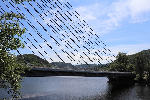 The Pont du Pertuiset over the Loire in the Gorges de la Loire - Suspension bridge with cable-stays - City of Unieux - Department of the Loire - France - Inaugurated in 1989