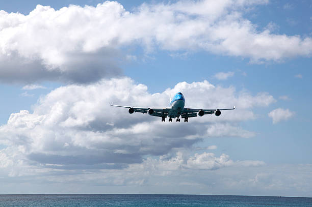 istock Airplane Descending Over Water 123097993