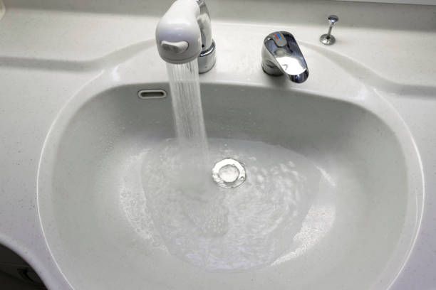 istock White washstand with wash bowl and shower head 1231014159