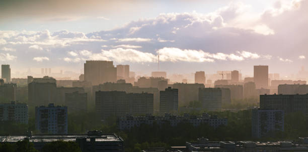 istock City in smoke sunset perspective 1231014162