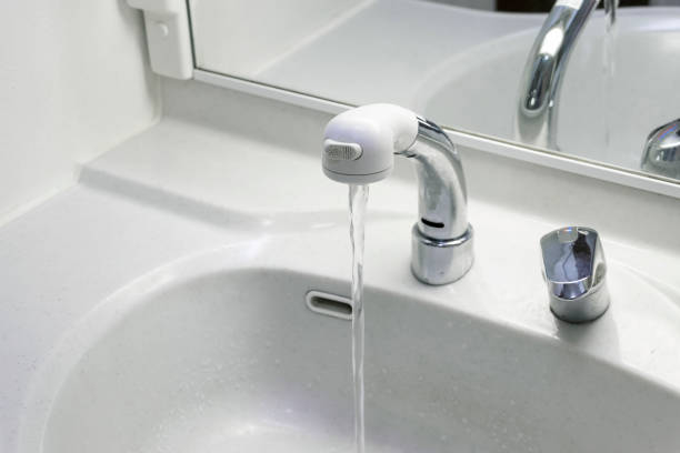 istock White washstand with wash bowl and shower head 1231014685